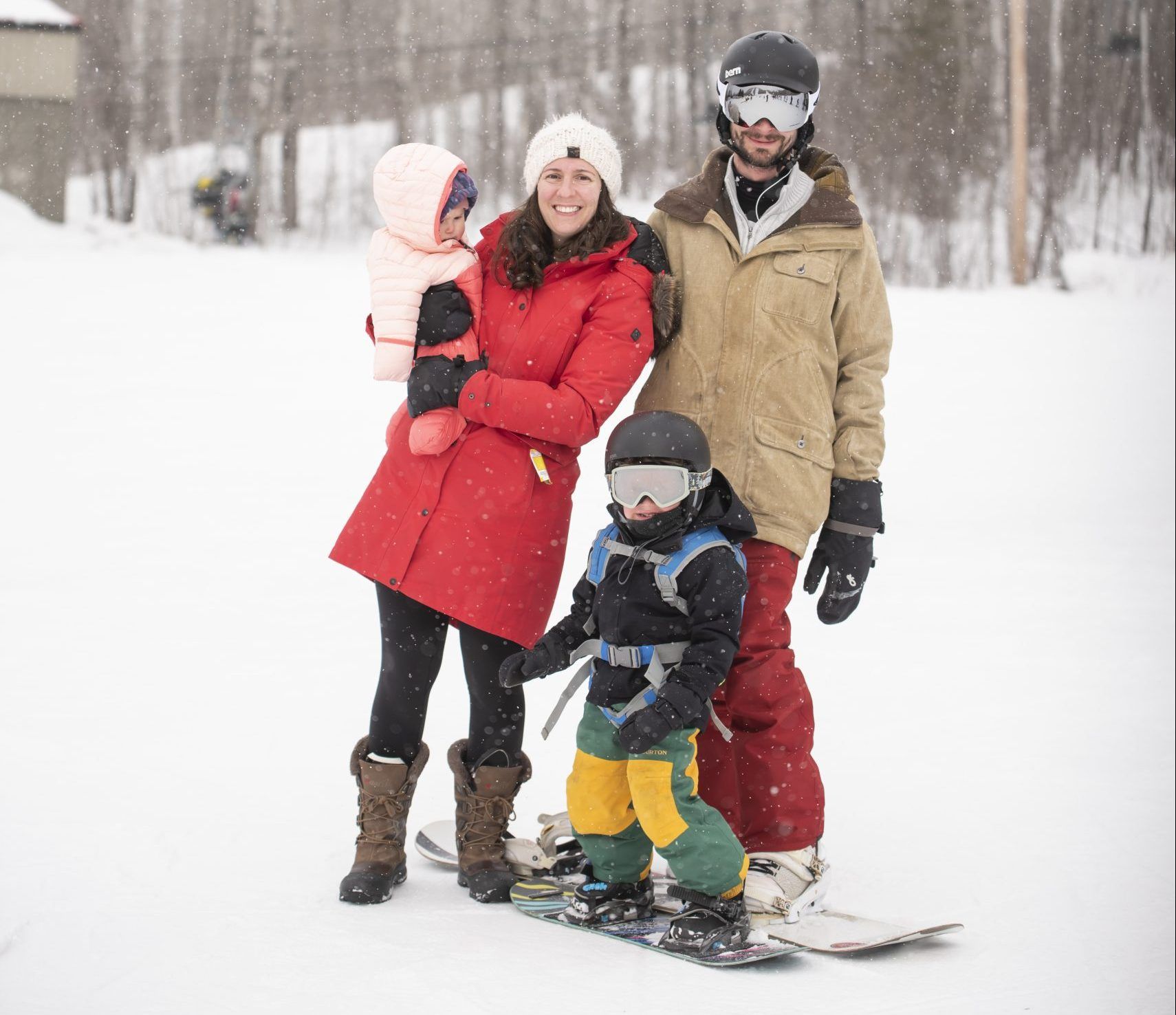 family of 4 with snowboards